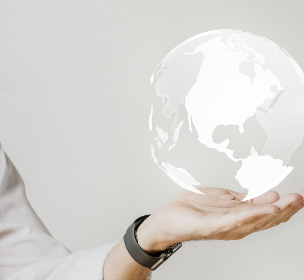 businessman-with-digital-world-his-hand (1)